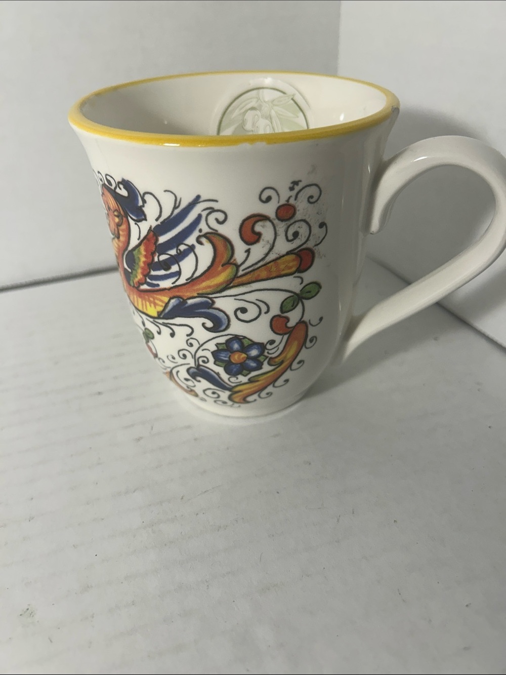 White Ceramic Mug with Yellow Trim and Colorful Floral-Phoenix Design